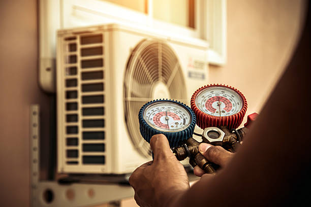 Professional Heat Pump Repair technician working in Joppa, MD